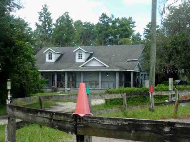 Auction Property. AUCTION- OCCUPIED. This unique gem offers approximately 4.89 acres with an income producing horse ranch with barns and stalls. The existing home offers 4 beds, 3 baths, with a wrapped front porch offering ample space to relax and entertain. The home has an attached 2 car garage, and has a well, and septic system. Imagine all the possibilities here. Property is sold as-is with NO interior photos, NO property disclosure or inspection reports, NO lease in place, NO ACCESS - the seller does not represent or guarantee occupancy status. NO VIEWINGS of this property. Please DO NOT DISTURB the occupant. "As is" CASH ONLY sale with no contingencies or inspections. Buyer will be responsible for obtaining possession of the property upon closing.