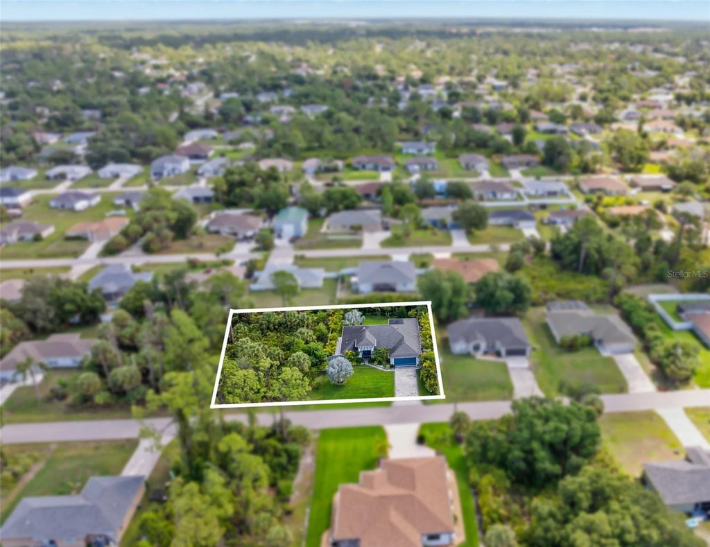 Photo of 2420 Sheila Lane, North Port, FL 34286 (MLS # D6148971)