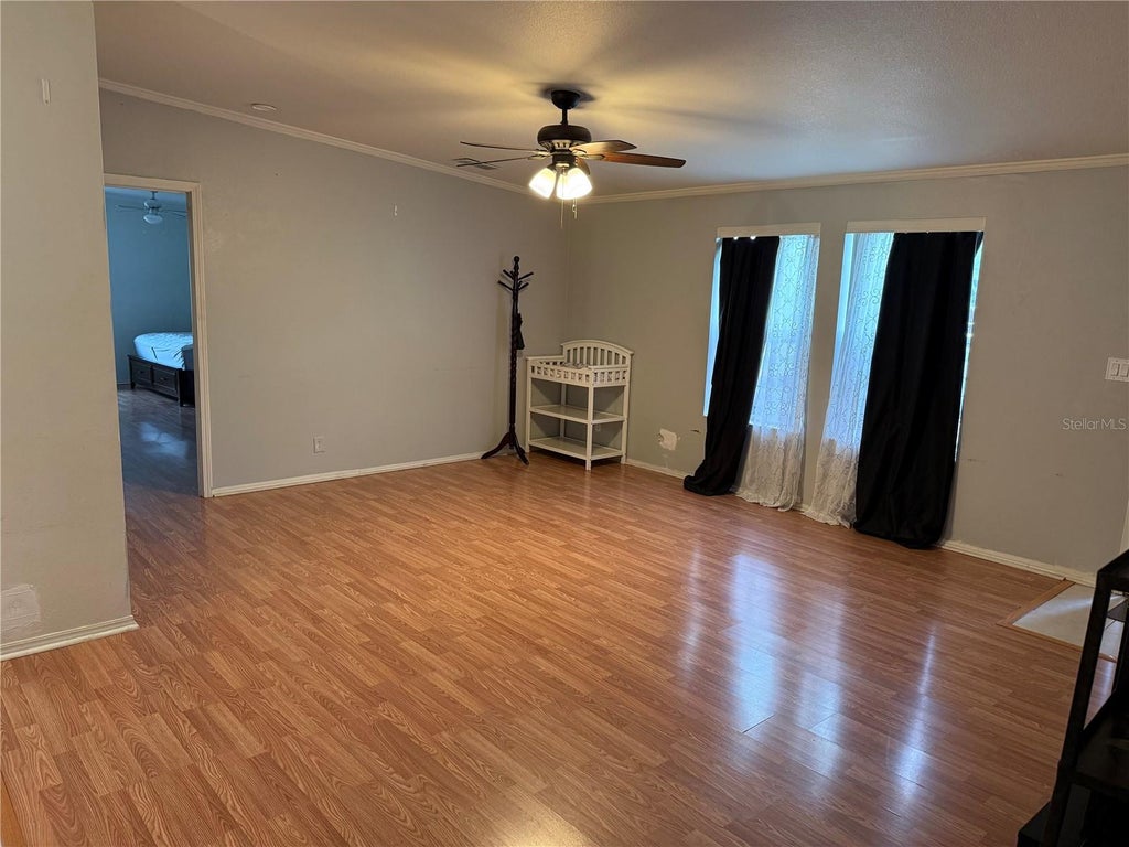 Photo of 4119 SE Lemon Avenue, Highland City, FL 33846 (MLS # L4964865)