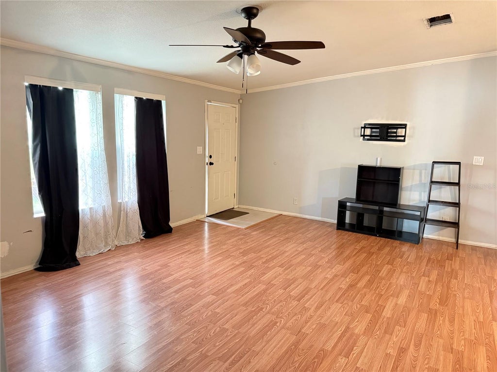 Photo of 4119 SE Lemon Avenue, Highland City, FL 33846 (MLS # L4964865)