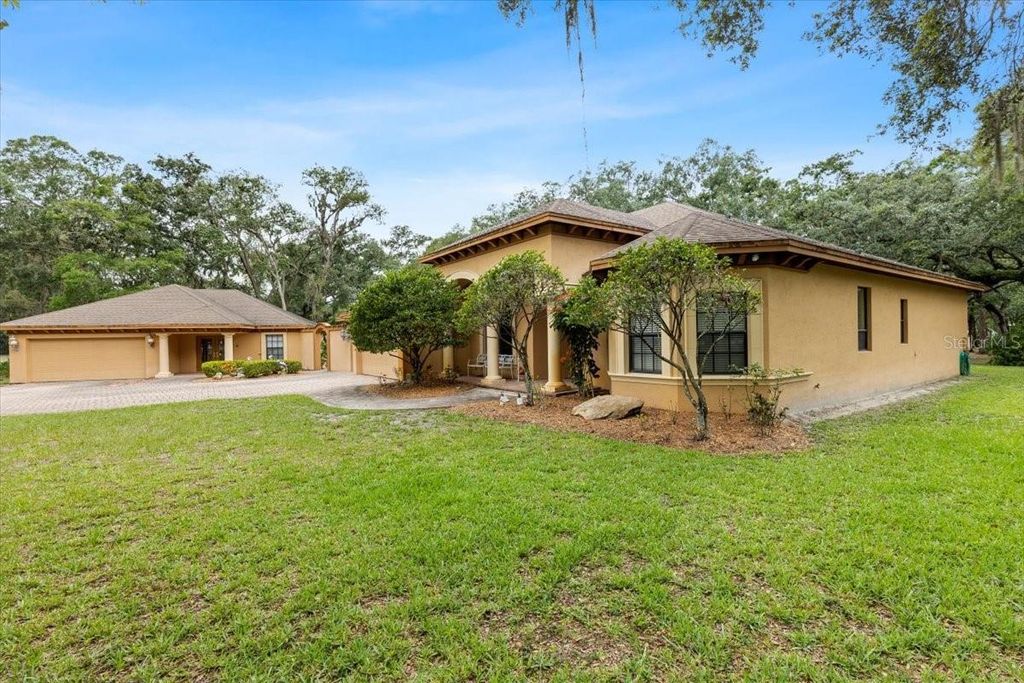 Photo of 16608 Livingston Avenue, Lutz, FL 33559 (MLS # TB8394167)