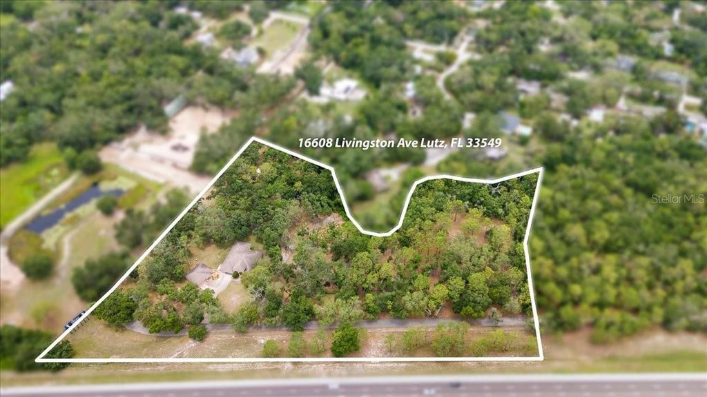 Photo of 16608 Livingston Avenue, Lutz, FL 33559 (MLS # TB8394167)