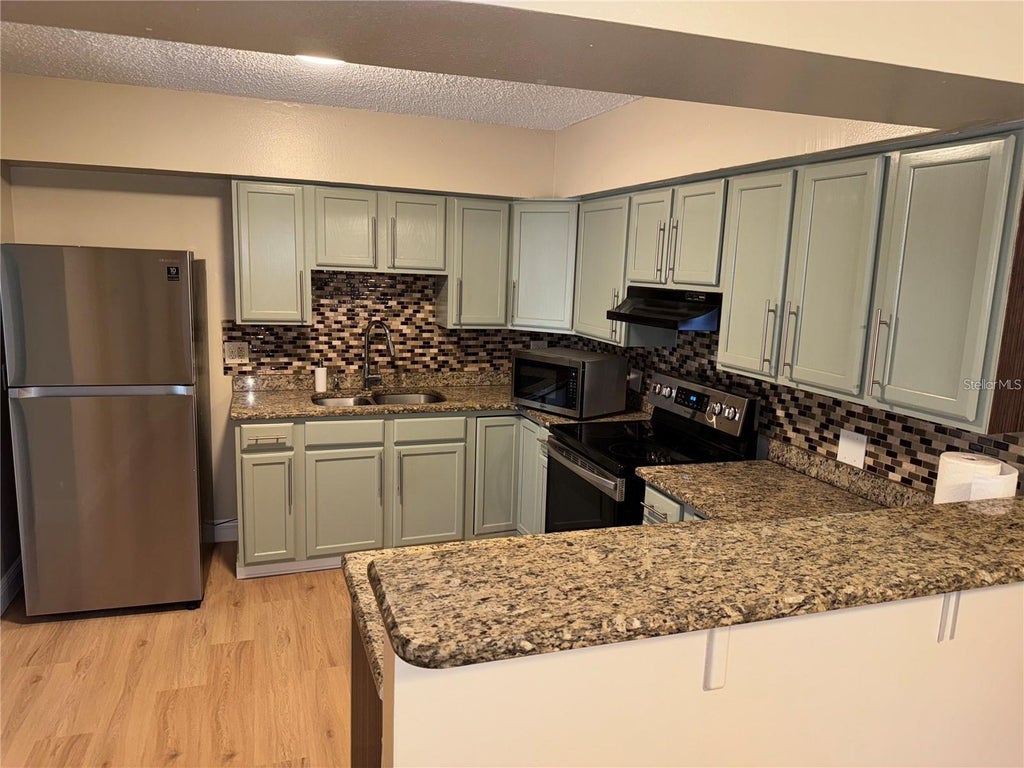 Photo of 613 Carol Ter #Main, Kissimmee, FL 34744 (MLS # S5157951)