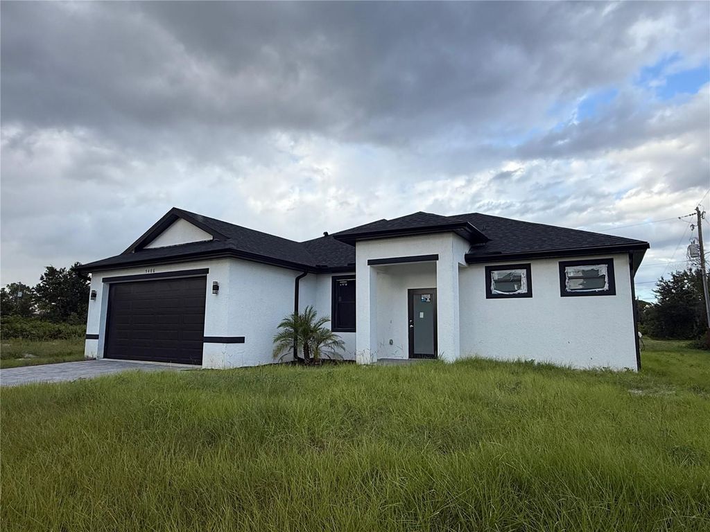 Photo of 5486 Riley Lane, Port Charlotte, FL 33981 (MLS # O6351490)