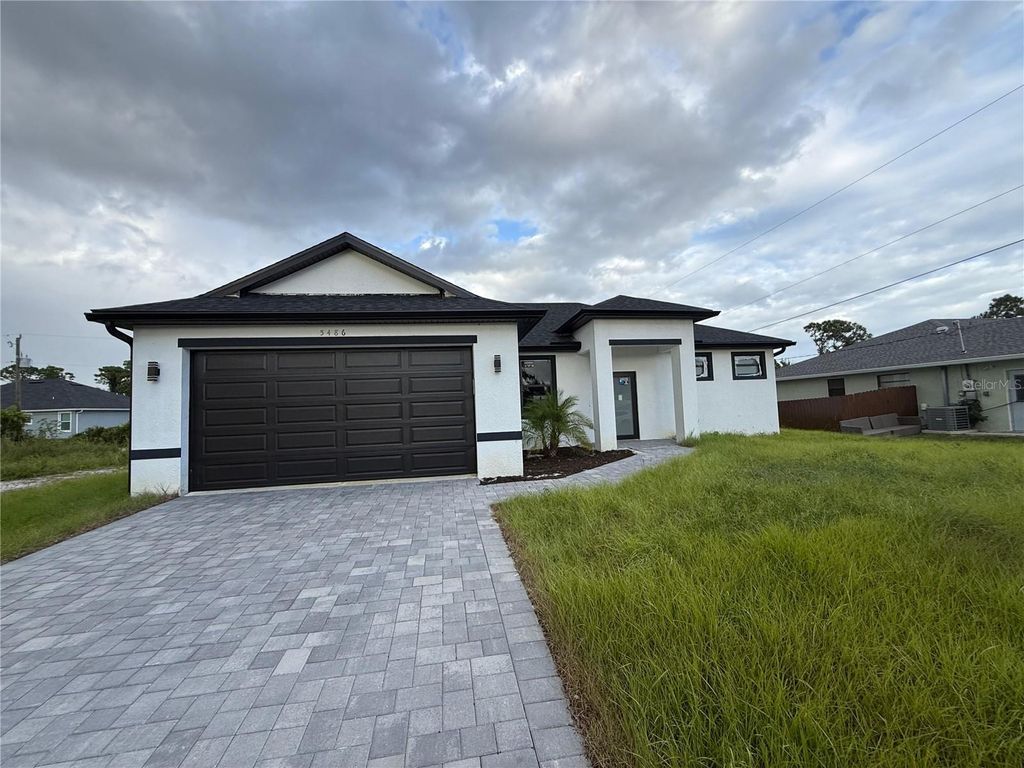 Photo of 5486 Riley Lane, Port Charlotte, FL 33981 (MLS # O6351490)
