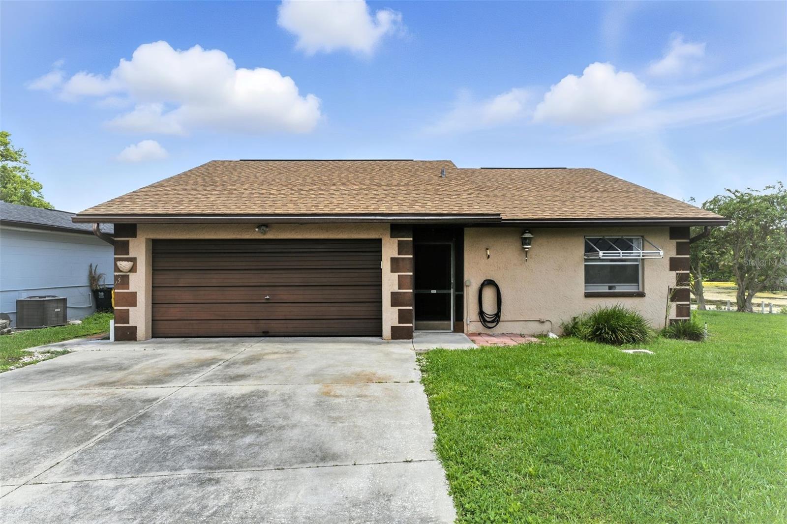 This is a handyman’s or handy ma’am’s dream come true! Welcome to your next great opportunity, a lakefront home with endless potential tucked away in the heart of Lakeland, Florida. This charming fixer-upper house for sale is nestled on a serene waterfront lot, offering unobstructed views of a beautiful Lake right from your backyard. Step outside and enjoy a peaceful setting with your own private pathway and wooden deck; perfect for fishing, relaxing, or simply soaking in the natural beauty of your surroundings. Whether you're an investor, DIY enthusiast, or a first-time homebuyer ready to renovate, this property is full of promise. Imagine sipping your morning coffee on a crisp fall morning, watching the sunrise dance across the water. Around 100ft of Lake frontage. Get your showing today!