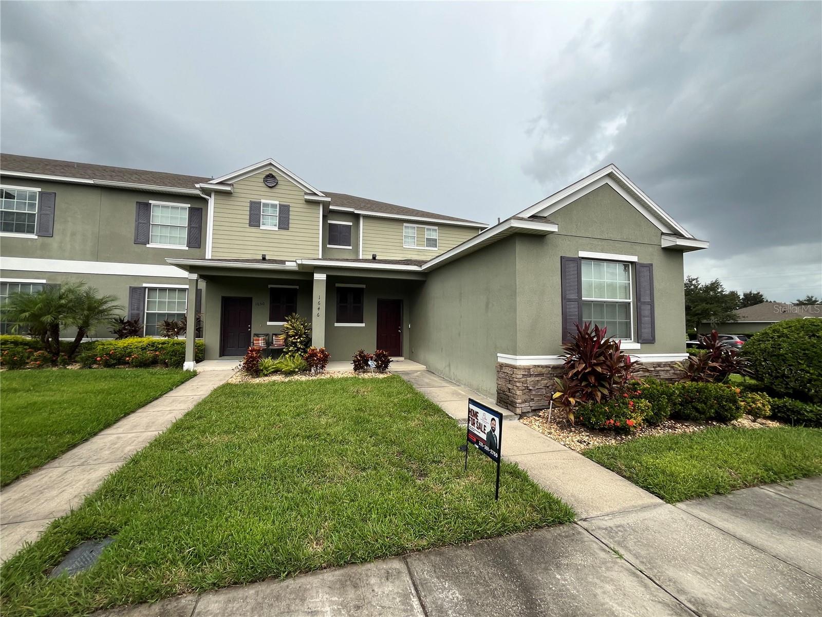 This stunning 2-story corner home is located in the highly desirable gated community of Beacon Park in Meadow Woods, Orlando, offering both comfort and modern style. With 2,134 square feet of thoughtfully designed living space, the home features 3 spacious bedrooms and 2.5 bathrooms, along with a 2-car attached garage, all situated on a 2,694 square foot lot. The main floor is highlighted by a luxurious master suite that includes an en-suite bathroom with dual sinks, a separate soaking tub and shower, and a generous walk-in closet, providing a private retreat. The open-concept kitchen is equipped with black appliances and seamlessly connects to the dining and living areas, creating an ideal space for entertaining family and friends. Upstairs, two additional bedrooms, a full bathroom, and a large bonus room provide flexibility for guests, office space, or recreational use. The home features a variety of flooring including durable ceramic tile on the main level and soft carpeting in the bedrooms and bonus room, while ceiling fans in multiple rooms and window treatments throughout enhance comfort and style. Residents of Beacon Park enjoy a wealth of community amenities, including a sparkling community pool, playgrounds for children, walking and running trails, BBQ areas perfect for outdoor gatherings, tennis courts, a well-equipped clubhouse, and a fitness center. Conveniently located just minutes from Orlando International Airport (MCO), Lake Nona Medical City, and major highways including SR 417 and SR 528, this home provides easy access to shopping, dining, and entertainment, making it an exceptional opportunity for families or anyone seeking a modern, well-appointed home in a vibrant and welcoming community.