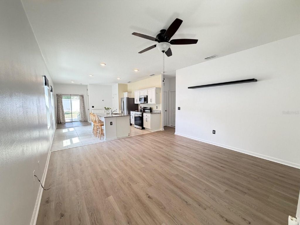 Photo of 2021 Hemingway Circle, Groveland, FL 34736 (MLS # O6402759)