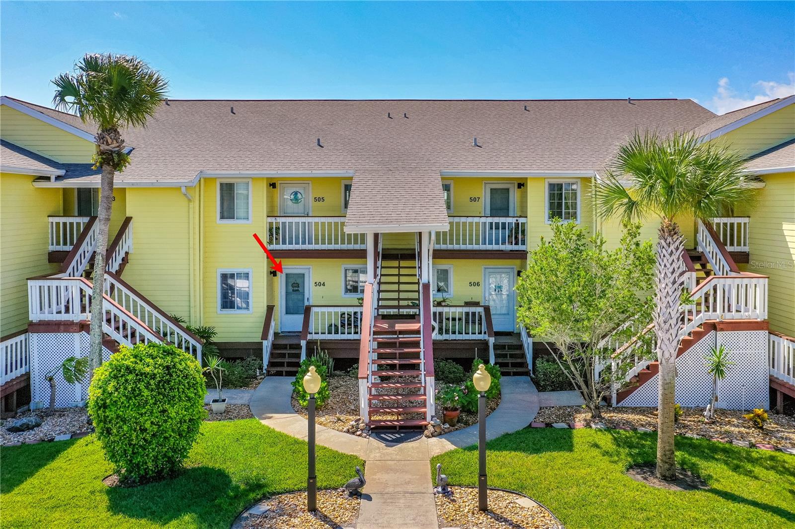This 2 bedroom, 2 bath direct riverfront residence is nestled in the secluded Ocean Marina Condos located in Flagler Beach. Newer tile floors and luxury vinyl plank (LVP) throughout. Brand new electrical panel, including breakers. Brand new light fixtures, ceiling fans, and outlets throughout the home. Both bathrooms have been remodeled with new vanities, sinks, faucets, fixtures, and commodes. The primary bedroom has gorgeous views that overlook the lake and Intercoastal Waterway. The kitchen is a good size for a condo, and it is equipped with a wet bar. Sit on the back porch and watch the dolphins play in the water almost every single day. Double pane insulated windows for energy efficiency. Stackable washer and dryer inside the unit. It also comes with an assigned parking spot. The community features include: Clubhouse, pool, bike storage, kayak ramp, tennis courts, exercise room, pool table, and BBQ stations. Beach access at end of the road. 2 miles from SR 100. AC 2018, WH 2014.