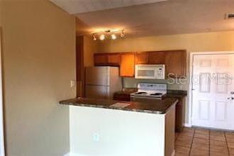 Photo of 5550 E Michigan Street #3321, Orlando, FL 32822 (MLS # O6448375)