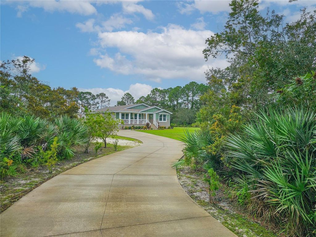 Photo of 875 Volco Road, Edgewater, FL 32141 (MLS # NS1087417)