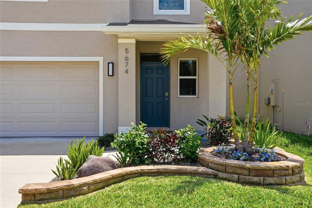 Photo of 5674 Chorleywood Lane, Wesley Chapel, FL 33545 (MLS # TB8553003)