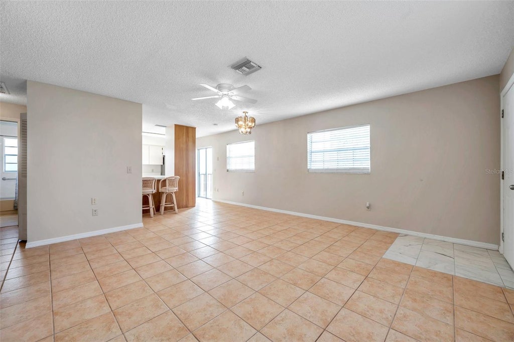 Photo of 6632 Hickorywood Ln #4B, New Port Richey, FL 34653 (MLS # W7890449)