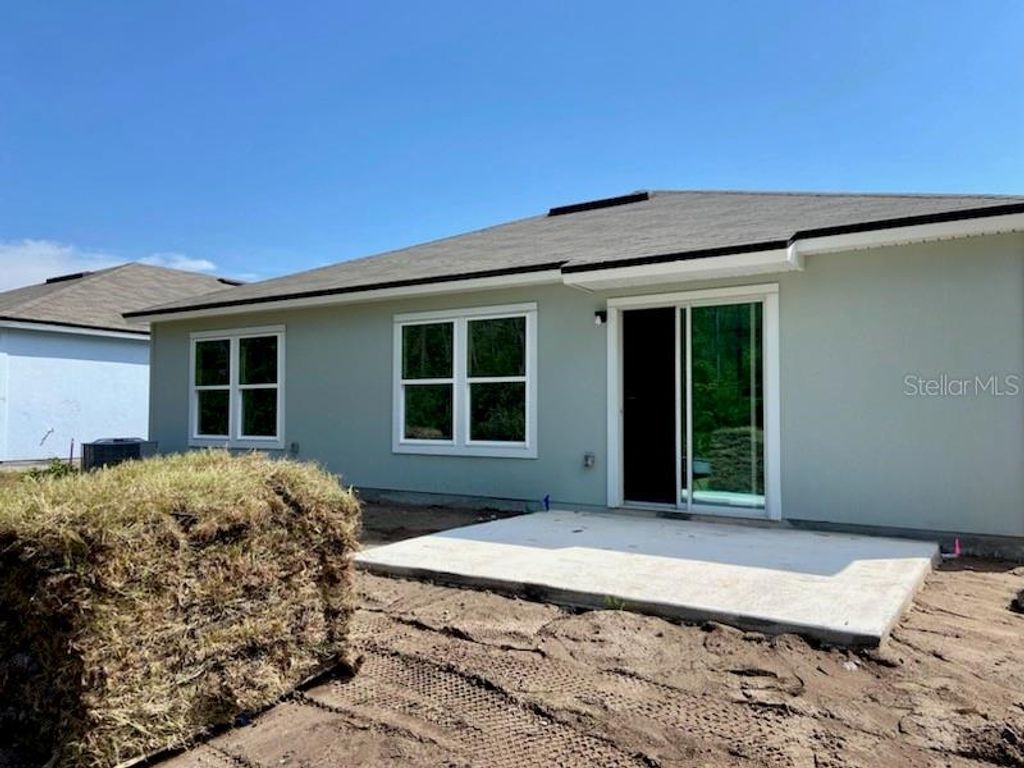 Photo of 116 Hulett Woods Road, Palm Coast, FL 32137 (MLS # FC301834)