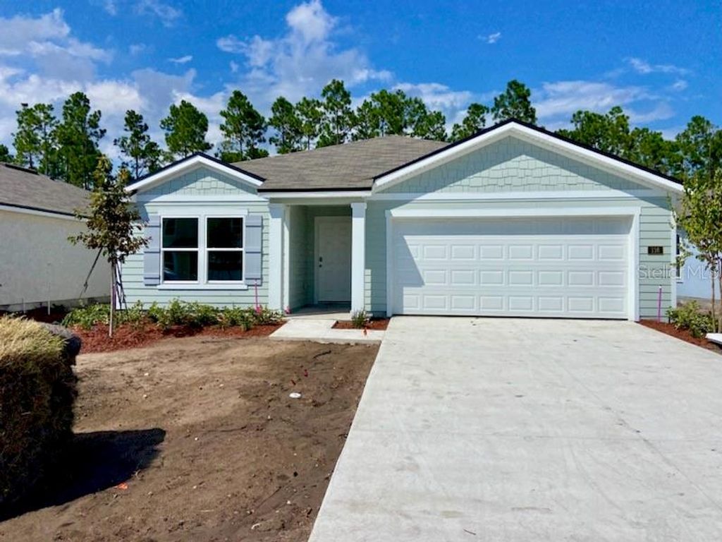 Photo of 116 Hulett Woods Road, Palm Coast, FL 32137 (MLS # FC301834)