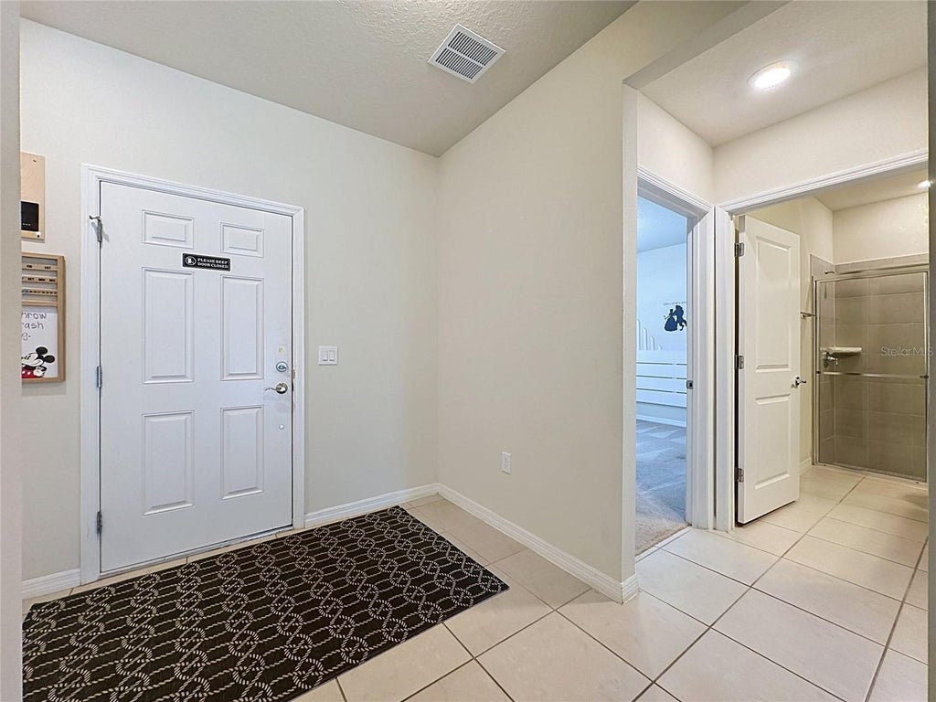 Photo of 920 Paradise Dr, Davenport, FL 33837 (MLS # S5159467)