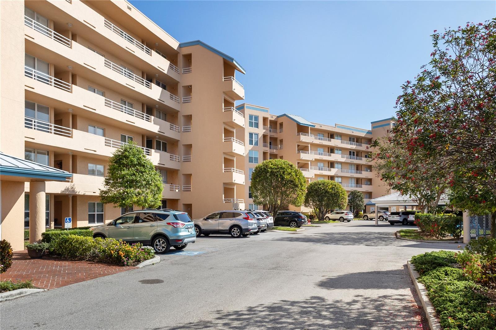 Looking for an affordable condo to escape the cold weather, then this one is for YOU! Enjoy breathtaking sunsets over the pond from this beautiful fourth-floor, 2-bedroom, 2-bathroom condo overlooking the scenic Pinebrook Golf Course. The glass-enclosed lanai offers a perfect space to relax while taking in the serene golf course views. This well-appointed condo features an eat-in kitchen, a spacious living and dining area, and a primary bedroom with a walk-in closet. The indoor laundry room includes a modern LG Graphite Steel Front Load Washer and Dryer with Mega Capacity TurboWash® and Steam Technology (5.2 cu. ft.), offering top-of-the-line convenience. Both bathrooms have been beautifully upgraded with custom-built vanities featuring Cambria quartz countertops and soft-close cabinetry. Additional highlights include a detached carport and an extra storage unit conveniently located near the elevator. The community boasts fantastic amenities, including a clubhouse with a heated pool and spa, fitness center, billiards, ping-pong, library, and tennis courts. Pinebrook Golf Course is a public, pay-as-you-play course meaning no extra fees for residents.
Ideally situated near downtown Bradenton, Sarasota, IMG Academy, and the world-famous Gulf Beaches, this condo offers the perfect blend of comfort, convenience, and resort-style living. Vacant and Easy to Show!!!