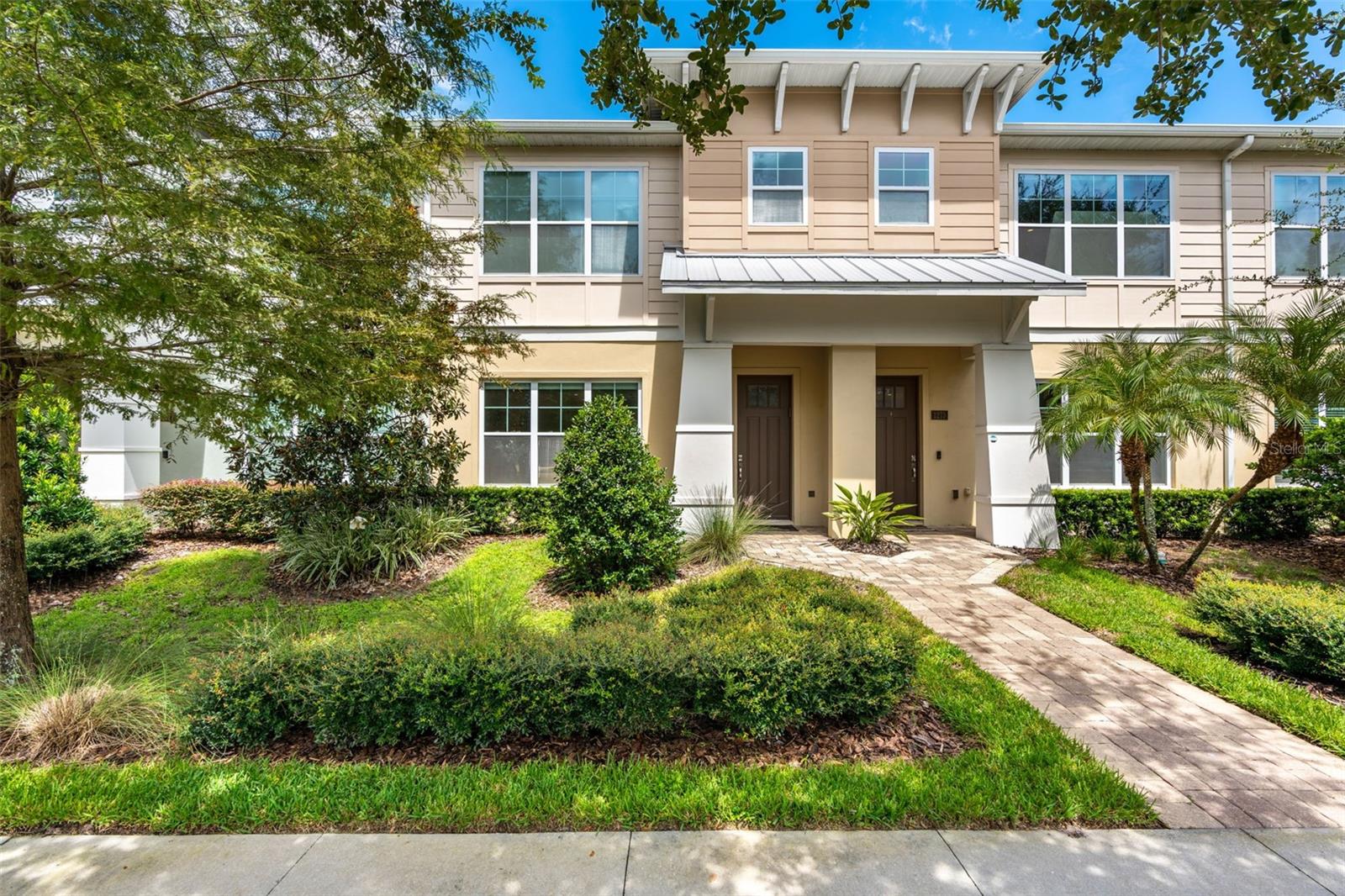 Welcome to this stunning townhome in the heart of Winter Park, built by award-winning Osprey Custom Home Builders. This residence combines timeless design, coastal aesthetic, certified greb construction, energy efficiency, and modern smart-home conveniences.
Featuring 3 bedrooms, 2.5 baths, and an open-concept layout, the home is filled with designer finishes and thoughtful details throughout. The first floor offers inviting living and dining areas with plank-style tile floors, surround sound speakers, and high ceilings. The gourmet kitchen is equipped with maple cabinetry, a generous island with waterfall quartz countertops, Samsung stainless steel appliances, a bar, pantry, and walk-in closet. From the kitchen, triple sliders open to a private walled courtyard, perfect for outdoor dining and entertaining, and an oversized 2-car garage.
Upstairs, the spacious primary suite includes a luxurious glass-enclosed walk-in shower, double vanity, and large custom walk-in closet. Two additional bedrooms, also with custom closet built-ins, share a well-appointed bath with high-end finishes. An oversized laundry room completes the second floor.
Smart Home features include a WiFi-enabled garage and thermostat, central smart-home hub, and central vacuum system with a built-in kitchen dustpan. Other upgraded features include designer moldings, solid doors, and Andersen windows. Designed with comfort, convenience, and sustainability in mind, this home is in immaculate condition and move-in ready.
Ideally located just minutes from Park Avenue, Rollins College, Mills 50, Ivanhoe, Trader Joe’s, Whole Foods, Advent Health, and Downtown Orlando, this property offers easy access to fine dining, shopping, and Central Florida attractions.
Don’t miss the opportunity to enjoy luxury, convenience, and modern efficiency in one of Winter Park’s most desirable townhome communities. Schedule your private showing today!