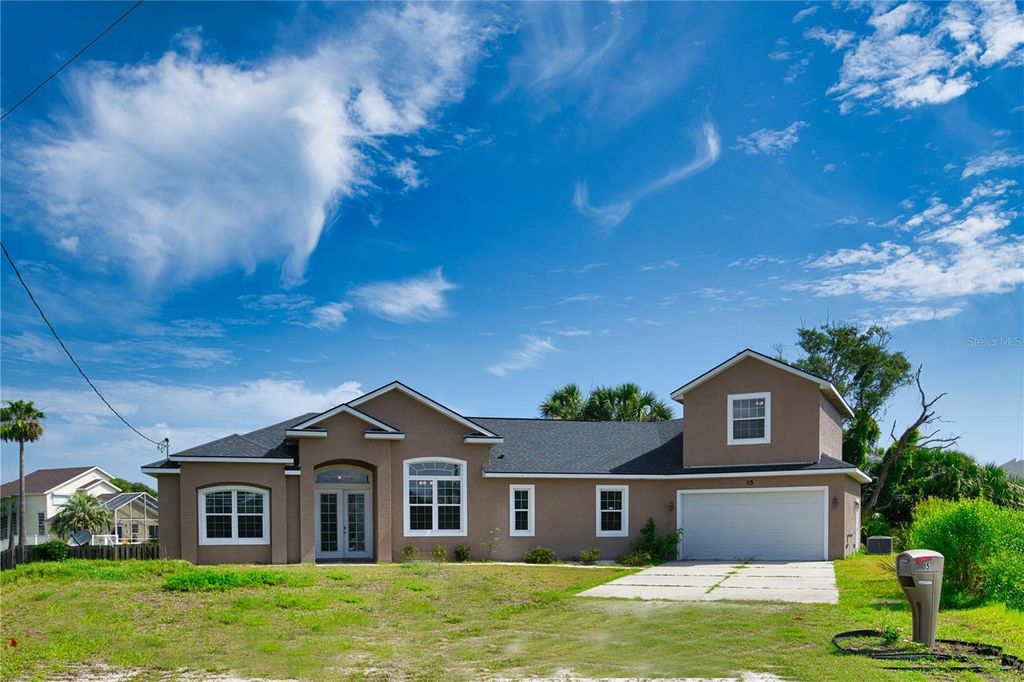 Photo of 15 Dogwood Terrace, Palm Coast, FL 32137 (MLS # FC315969)