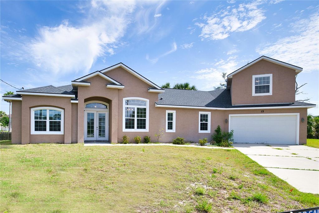 Photo of 15 Dogwood Terrace, Palm Coast, FL 32137 (MLS # FC315969)