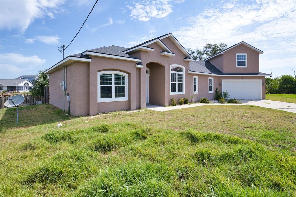 Photo of 15 Dogwood Terrace, Palm Coast, FL 32137 (MLS # FC315969)