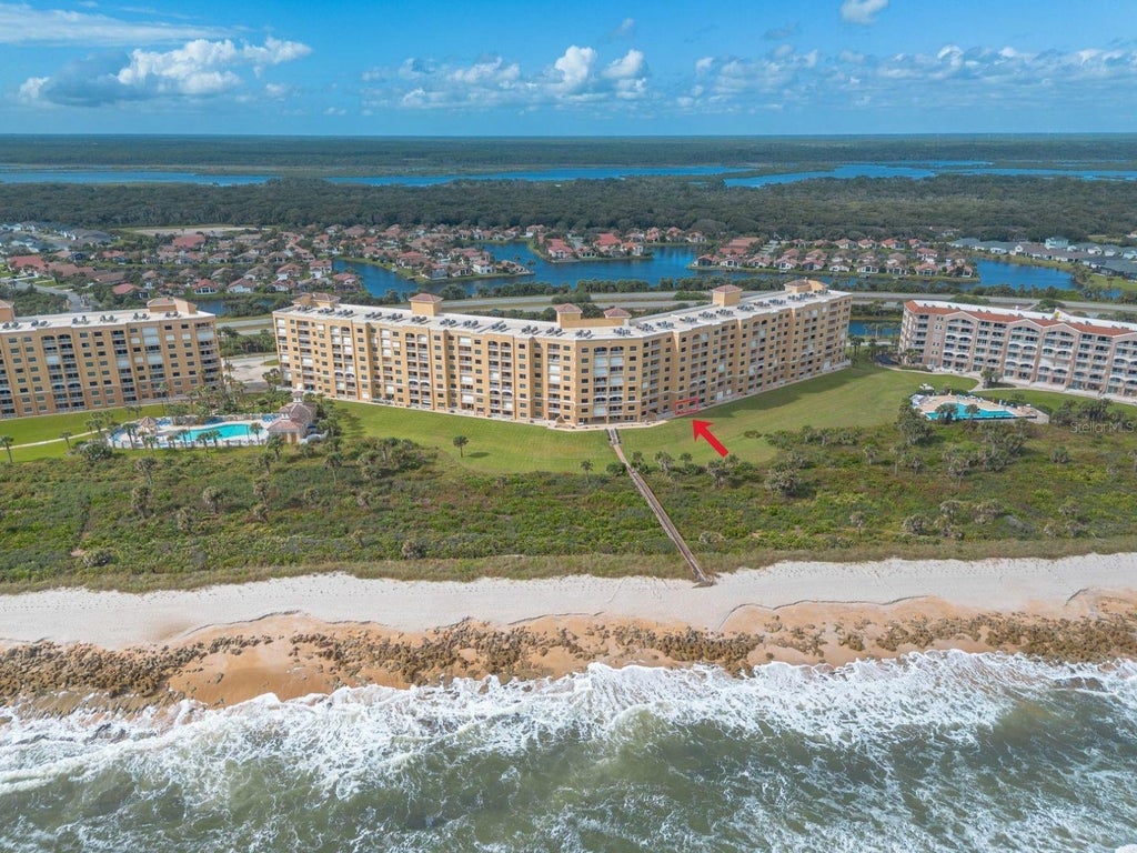 Photo of 80 Surfview Drive #110, Palm Coast, FL 32137 (MLS # NS1089551)