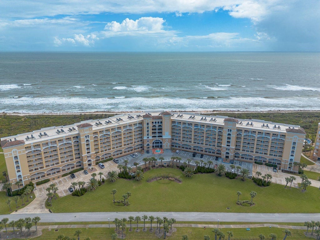 Photo of 80 Surfview Drive #110, Palm Coast, FL 32137 (MLS # NS1089551)
