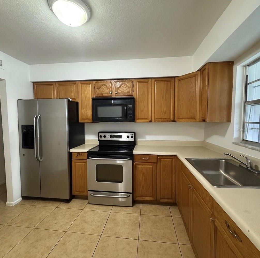 Photo of 1831 Wilton Avenue, Orlando, FL 32805 (MLS # O6422796)