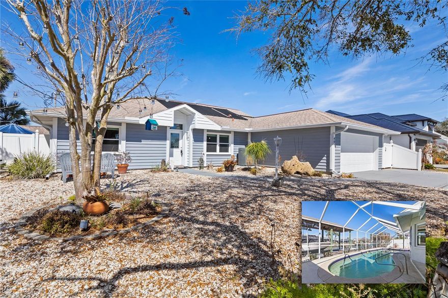 Experience the ultimate Florida waterfront lifestyle in this beautifully maintained saltwater canal POOL home that has NEVER flooded and is thoughtfully designed for relaxed coastal living. Tucked away on a quiet cul-de-sac along one of the area’s most desirable streets—with homes on only one side and serene water views on the other—you’ll enjoy both privacy and picturesque surroundings. Located just five homes from the Intracoastal Waterway on 80 feet of frontage, this property is truly a boater’s paradise. Curb appeal abounds with mature landscaping and a maintenance-free yard finished in decorative landscape rock—no mowing or watering required. Inside, you’ll find a bright split floor plan with soaring ceilings and new wood-look tile flooring throughout—completely carpet-free for easy living.

The kitchen showcases exotic stone countertops, a classic subway tile backsplash, and a charming breakfast nook overlooking the pool and canal. The formal dining room flows seamlessly into the spacious family room, which opens to a secondary living area featuring a cozy wood-burning fireplace—perfect for gathering and entertaining.

The expansive primary suite offers a walk-in closet and an updated en-suite bath with a custom vanity and enclosed walk-in shower. Generously sized guest bedrooms are paired with a recently updated bath complete with a stunning vanity and tub/shower combination.

Step outside to your private waterfront oasis featuring a covered patio, screened-in solar-heated self-cleaning pool, brand new hot tub, decorative pavers, and stamped concrete decking. Boating enthusiasts will appreciate the 30-foot boathouse with an 8,000 lb lift with auto-stop and a 12x10 dock with a swing—ideal for relaxing evenings or reeling in your next catch.

Additional highlights include hurricane-rated windows and sliders, fresh interior and exterior paint, a concrete seawall, fully fenced yard, storage shed, and indoor laundry room. Hop in your golf cart to enjoy the convenience of nearby local restaurants and waterfront hangouts, all within walking distance.

Don’t miss this exceptional opportunity to own a slice of paradise—schedule your private showing today and start living the Florida dream.  ***Make sure to check out the virtual tour for a walkthrough video***.