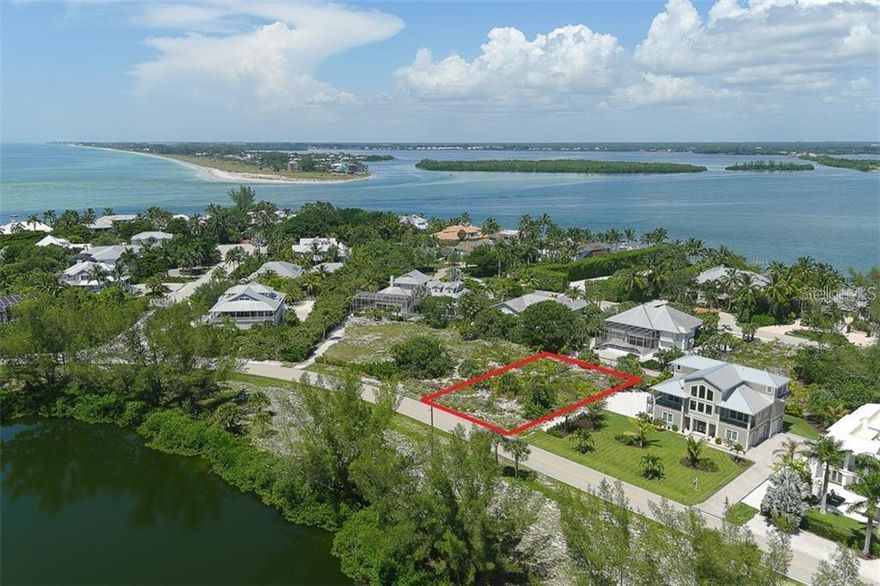 Located in the Boca Grande community of Gulf Shores North, this southerly facing lot is available for development. It includes deeded beach access, offering views of Lake Gasparilla and opportunities for walks along Gulf beaches. The location provides convenient access to both on-island and off-island restaurants and shopping.