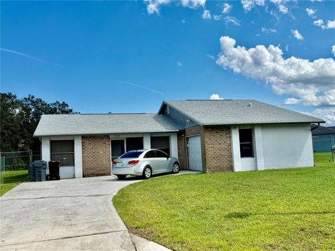Photo of 722 Tournament Lane, Kissimmee, FL 34759 (MLS # O6342070)