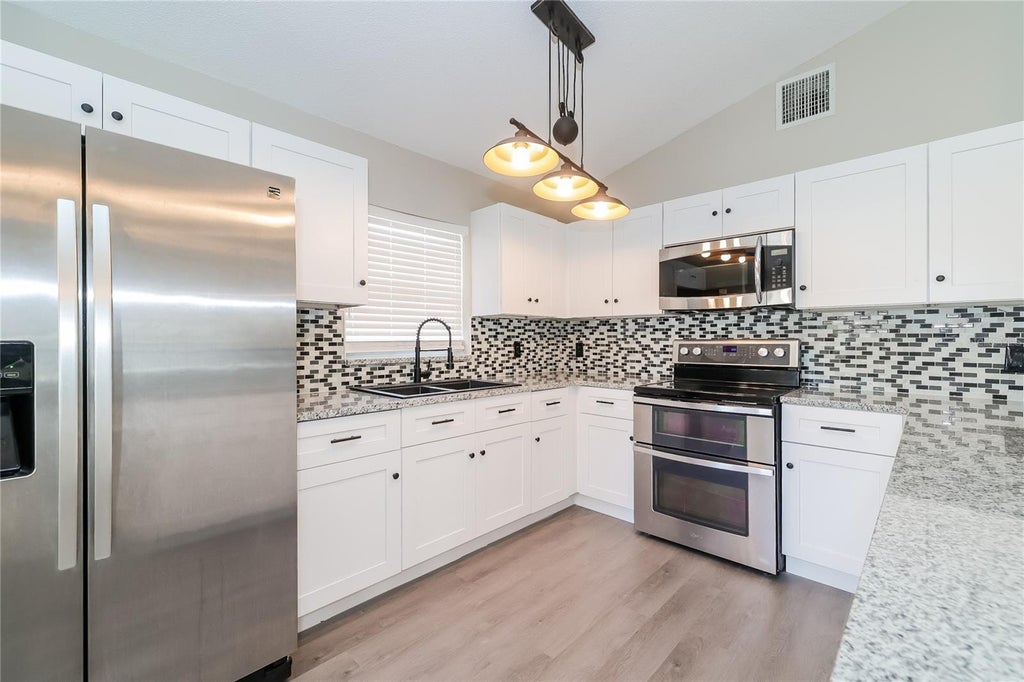 Photo of 602 Elfrida Way, Kissimmee, FL 34758 (MLS # TB8548174)