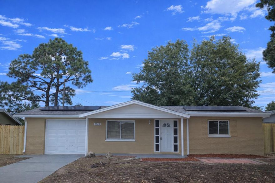 DON'T MISS THIS OPPORTUNITY TO GIVE YOUR BUYERS WHAT THEY WANT OR NEED.....Let them choose from $6000 in closing costs assistance or mortgage buydown, if that's not needed, take $6000 off the price! Want a Home Warranty?...SURE, that's included too! PLUS...NO HOA and NO Flood Zone and UNAFFECTED from the Storms! The home has been FRESHLY painted Inside and Outside,  offers a Modern and Updated Kitchen with Granite Countertops/Backsplash and Undermounted Sink. NEWLY updated kitchen Appliances, NEW Carpet and Flooring, NEW Energy Efficient LED lighting thoughout, NEW Window Treatments, NEW AC....AND and the house comes with a SOLAR Electric System that is FULLY paid for...cost of monthly electricity is almost free! The 3rd Bedroom is perfect for an office or playroom depending on your buyers needs! A larged fenced back yard is perfect for enjoying our Florida Lifestyle! Centrally located in Pasco County with easy access to everything