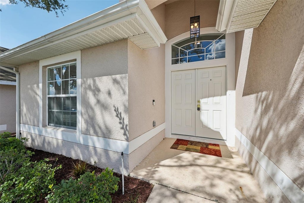 Photo of 136 Grantham Drive, Davenport, FL 33897 (MLS # TB8558343)