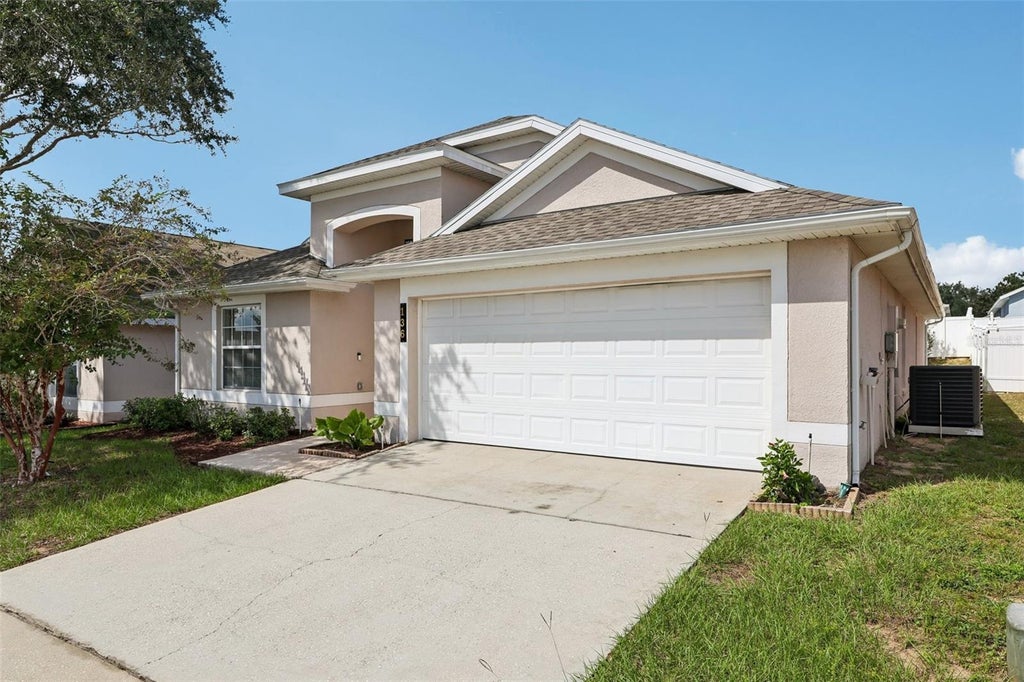 Photo of 136 Grantham Drive, Davenport, FL 33897 (MLS # TB8558343)