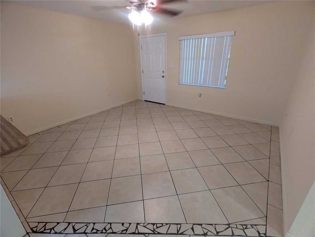 Photo of 824 N Saint Clair Abrams Avenue, Tavares, FL 32778 (MLS # G5115668)