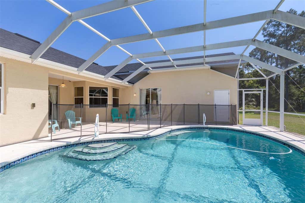 Photo of 18 Squirrel Place, Palm Coast, FL 32164 (MLS # FC320652)