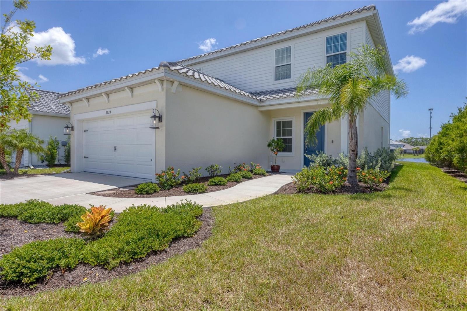 One or more photo(s) has been virtually staged. This Nearly New Waterfront Home in Grand Park is Move In Ready!
Skip the wait and the construction dust—this 2024 built home is a spacious 2,143 sq. ft. It is located in Neal Communities’ sought-after Grand Park and it is ready for you now. Set on a premium homesite with a long, sparkling water view, this residence offers 3 bedrooms, 2.5 baths, Plus a DEN on the lower level, a LOFT on the second level, and a laundry conveniently located near the bedrooms.
Built just months ago, the home boasts lush landscaping, giving you instant curb appeal! Inside, abundant windows flood the home with natural light, highlighting the open-concept living spaces designed for comfort and entertaining. There are lovely water views from the kitchen, great room and from the spacious primary suite! Also, the loft and the den provide two flexible spaces for a media room, play area, home gym, or home office.
Enjoy all the resort-style amenities Grand Park is known for—beautiful pools, pickle-ball and tennis courts, walking trails, parks, and vibrant community spaces!
With a prime location minutes from I-75 and just a short drive to the world-famous Siesta Key Beach, this home combines the best of Florida living: modern comfort, natural beauty, and no waiting to build.