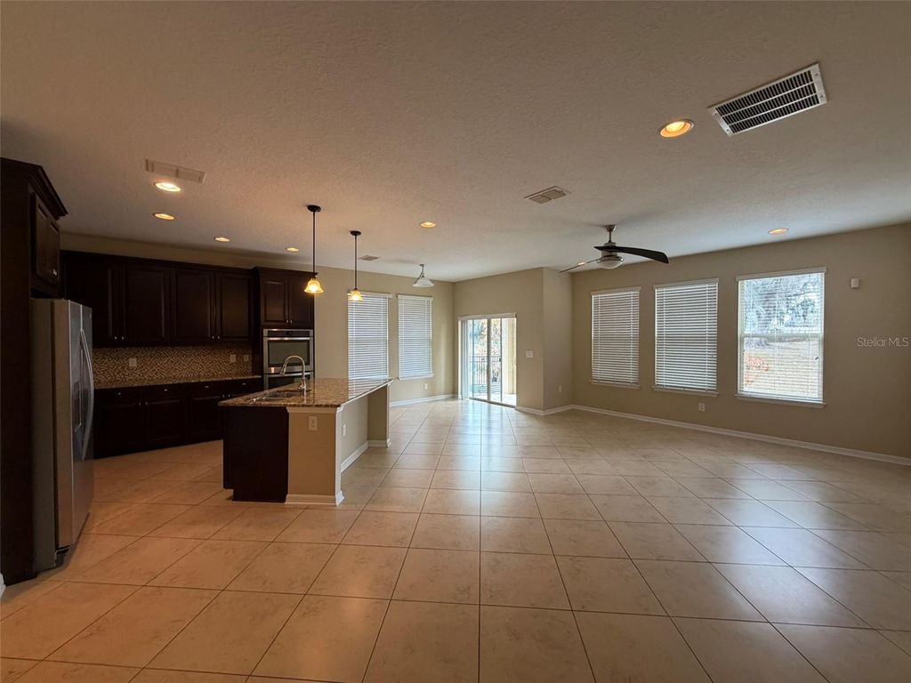 Photo of 4939 Rolling Green Drive, Wesley Chapel, FL 33543 (MLS # TB8476675)