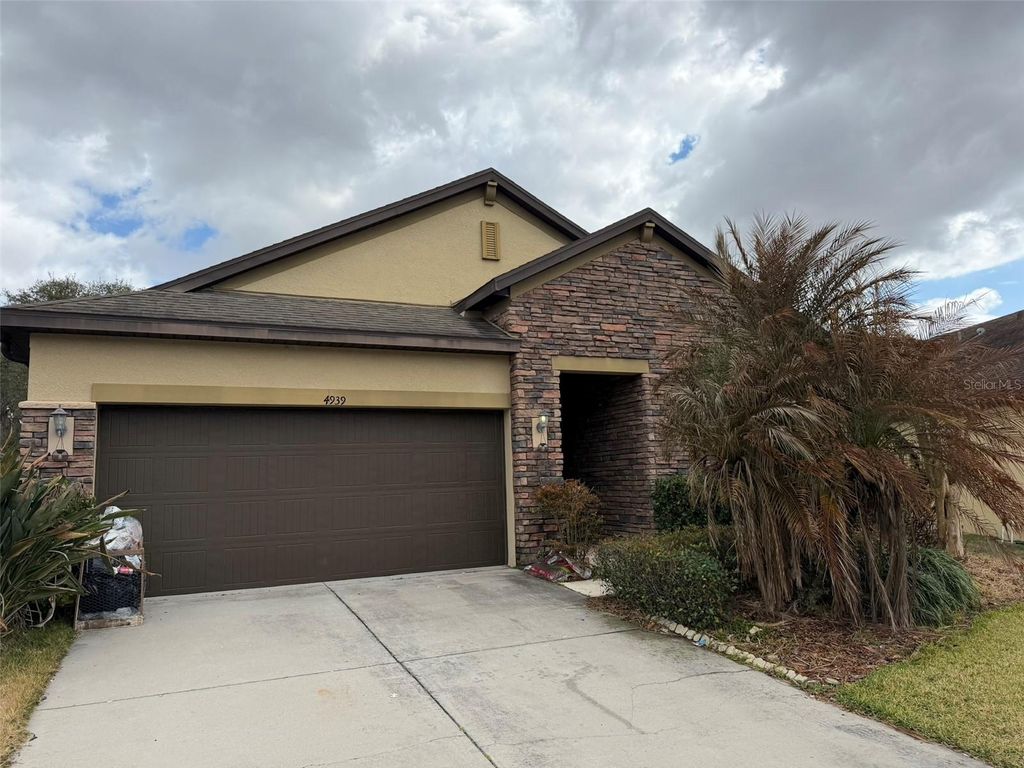 Photo of 4939 Rolling Green Drive, Wesley Chapel, FL 33543 (MLS # TB8476675)