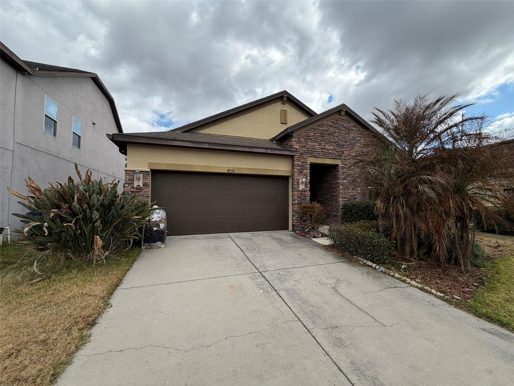 Photo of 4939 Rolling Green Drive, Wesley Chapel, FL 33543 (MLS # TB8476675)