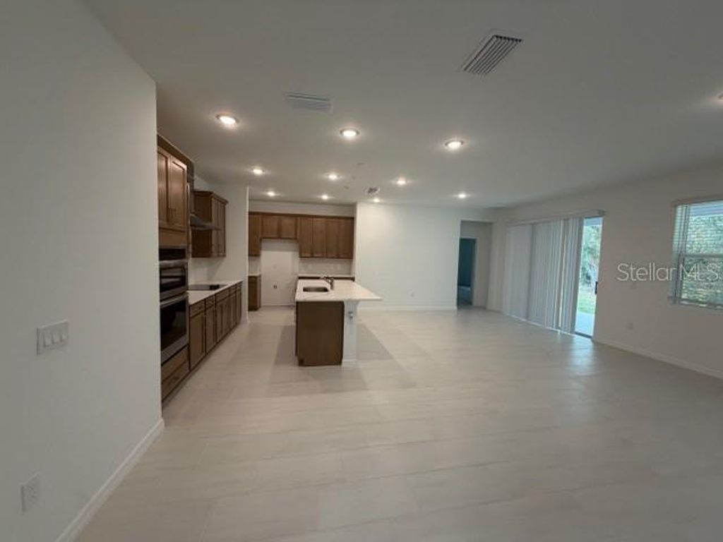 Photo of 2103 Rock Maple Bend, Kissimmee, FL 34746 (MLS # O6381843)