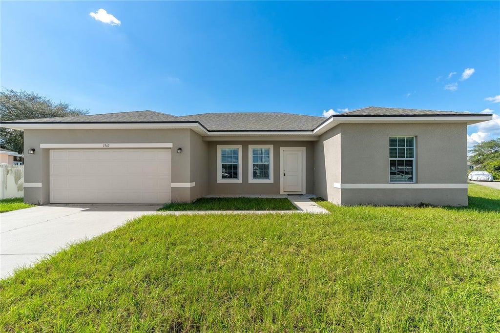 Photo of 1910 Lakeview Lane, Poinciana, FL 34759 (MLS # O6450307)