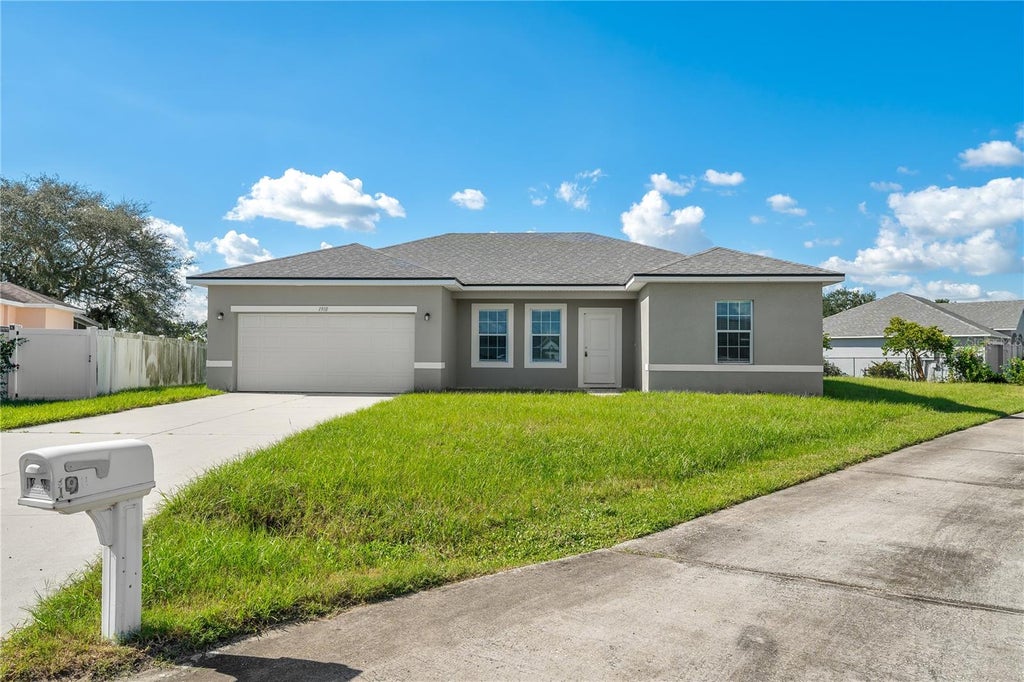 Photo of 1910 Lakeview Lane, Poinciana, FL 34759 (MLS # O6450307)