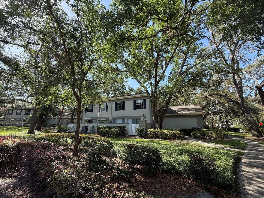 RAINTREE MANOR - Welcome to this charming 2-bedroom, 1.5-bath townhouse nestled in the desirable Raintree Manor neighborhood, offering a perfect blend of comfort and convenience. This well-maintained property presents an ideal opportunity for those seeking a modern living space in a sought-after location. As you step inside, you are greeted by a spacious and inviting living area bathed in natural light. The open floor plan seamlessly connects the living room, dining area, and kitchen, providing an excellent space for both entertaining and everyday living. The kitchen boasts NEW cabinets, sleek countertops, and updated appliances. Whether you are enjoying a cozy dinner with loved ones or hosting a gathering, the dining area provides an intimate setting for any occasion. The bedrooms are upstairs along with a full bath with tub/shower. This townhouse also features additional highlights such as laundry facilities and bonus room in the converted garage, and a private outdoor patio. Residents of this community have access to a range of amenities, including two sparkling swimming pools, a clubhouse, tennis courts, RV storage area and beautifully landscaped common areas. The complex is conveniently located near USF, VA, MOFFITT, shopping centers, restaurants, parks, and entertainment options, ensuring you're never far from the action. With its modern design, convenient layout, and desirable location, this townhouse is the perfect place to call home. Property is not in a flood area. Public Boat Ramp for Hillsborough River located nearby at Rotary Park - Fowler Ave and Morris Bridge Rd. Don't miss out on the opportunity to make this exceptional property yours!