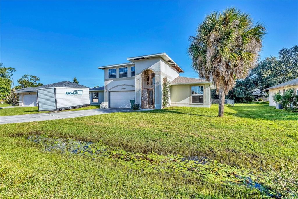 Photo of 23088 Mineral Avenue, Port Charlotte, FL 33954 (MLS # A4666042)