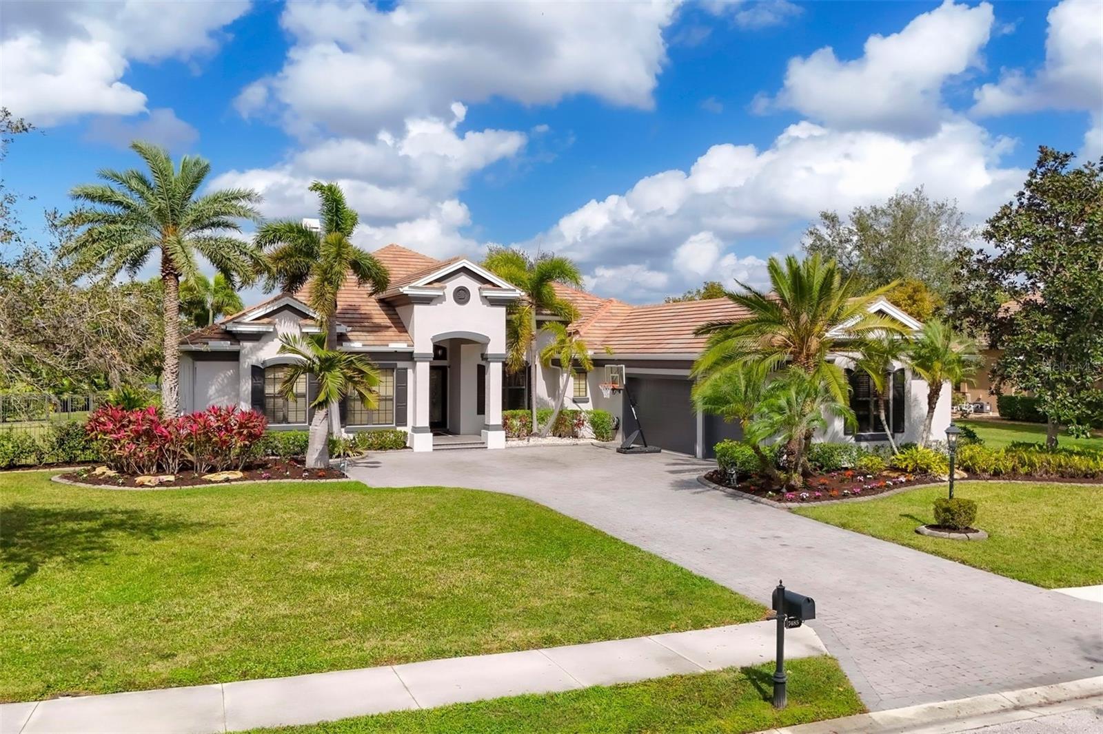 Welcome to this impressive 4BD/4.5BA + Office + Den + Heated pool & spa 3 car home located at 7485 Preservation Dr in Sarasota, Florida. Minimum 1 year lease offered furnished. Tenants responsible for electricity, water/sewer, gas, internet and cable. Owners provide: grounds maintenance, pest control, pool care and HVAC servicing. This remarkable home offers an expansive living space of 3,804 square feet and is situated on a generous lot of 30,492 square feet. Step into this luxurious 4-bedroom, 5-bathroom residence to find high ceilings and oversized windows that fill the space with natural light. The large kitchen is a culinary enthusiast's dream with ample counter space and stainless steel appliances. This home features walk-in closets providing plenty of storage options. For your convenience, it also includes a side-by-side washer and dryer setup. The outdoor living area is no less impressive with its heated pool and spa, perfect for relaxation or entertaining guests. The large lot provides ample room for outdoor activities while maintaining privacy and tranquility. Located within a gated community, residents will enjoy peace of mind knowing they are in a secure environment. Additionally, the neighborhood boasts proximity to great schools and shopping facilities making everyday life convenient. Sarasota itself offers an array of amenities such as pristine beaches, world-class dining experiences, art galleries, theaters, golf courses, nature trails and parks for outdoor enthusiasts. Whether you prefer quiet evenings at home or exploring the vibrant local scene, Sarasota has something to offer everyone. This beautiful home combines luxury living with the ultimate lifestyle location. It's not just about finding a place to live; it's about finding a place you'll love to call home. Please schedule showing request 24 hours in advance. HOA does not permit short term or seasonal rentals.