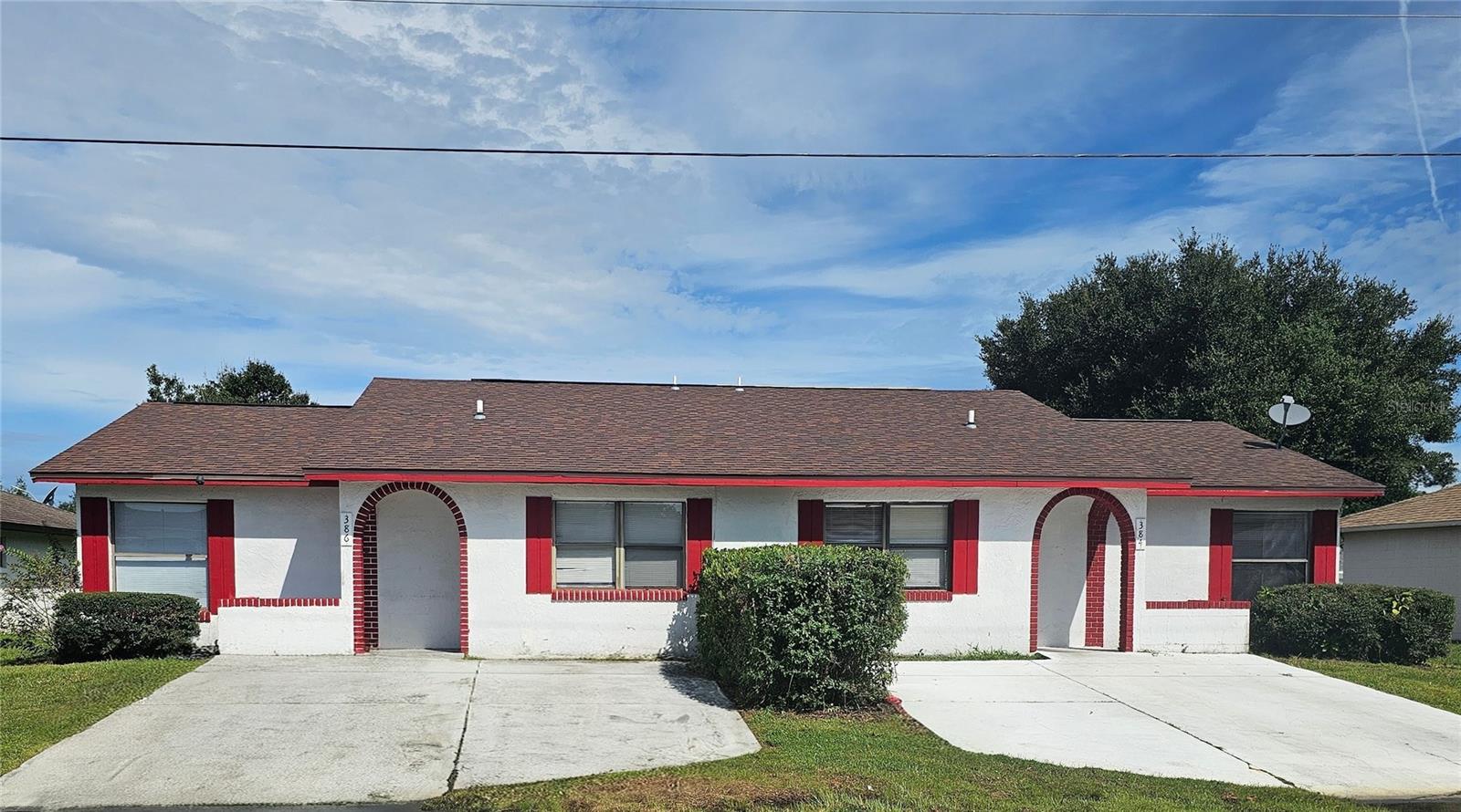 Excellent income opportunity. Rent both units or live on one side and rent the other. Ceramic tile in one kitchen with new carpet in bedrooms and wood look plank flooring in the main living areas and bathrooms. Each unit has its own screened porch with laundry/storage room. Cable and internet provided through the HOA