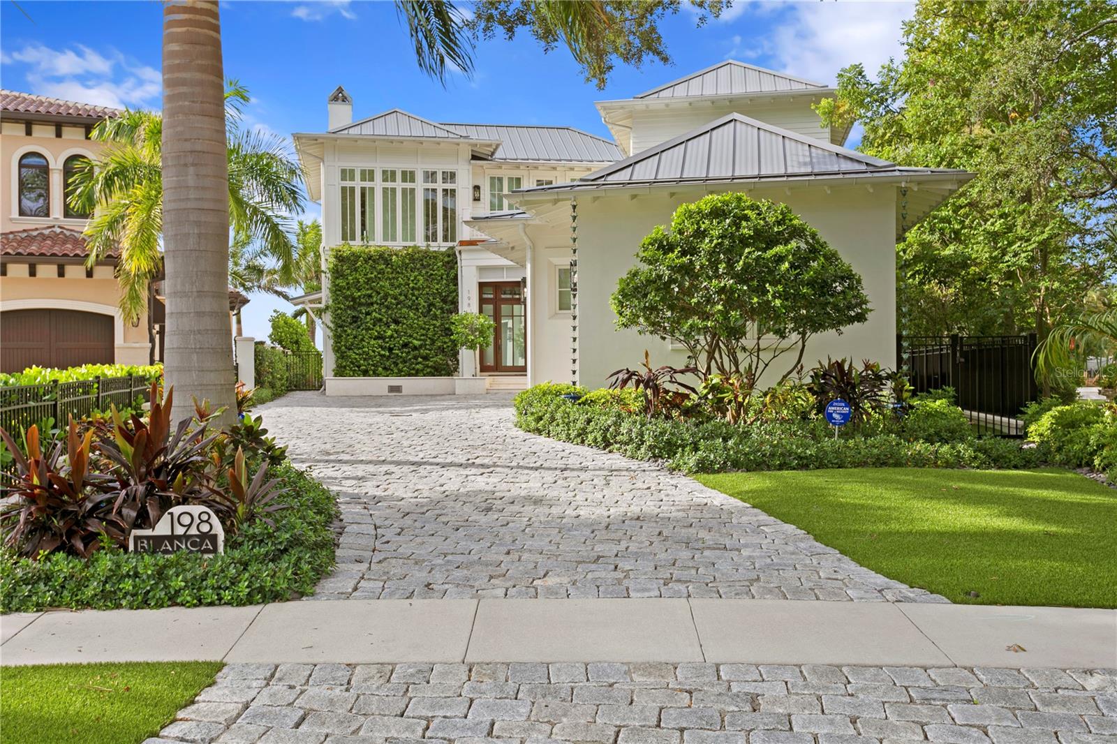 Wow!! Wow!! Wow!! Welcome to your Davis Island DREAM Home!!! This West Indies style architectural masterpiece was designed by well known architect Steven Smith and built by award winning builder Craig Ross. This 5,078 square feet 4-bedroom 6-bathroom home was built in 2019 and is a must see on highly sought after and very exclusive Davis Islands with beautiful open bay views. Drive up the Brick stone driveway and find the 3-car climate-controlled garage with additional golf cart parking space. Once inside you will be greeted by the beautiful Tampa Bay water view, with a strategically designed breakfast nook with amazing views. Second story wood tiled patio that is perfect for viewing sunsets and relaxing after a busy day. Beautifully designed custom closets, with hidden entry way. Laundry rooms conveniently located downstairs and upstairs. This home has a spectacular outdoor entertaining area, with a resort style feel. Infinity pool and jacuzzi, outdoor shower, fully equipped outdoor kitchen with bar that is perfect for entertaining family and friends. DO NOT MISS OUT on this unique opportunity to be on Davis Islands!!!