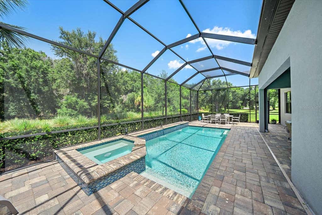 Photo of 809 Sigsbee Loop, Sarasota, FL 34240 (MLS # A4699879)